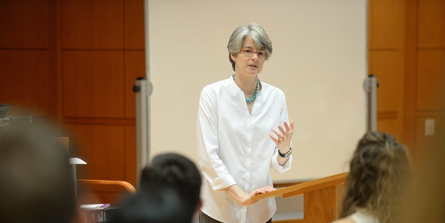 A photo of Professor Emily Kadens delivering a lecture