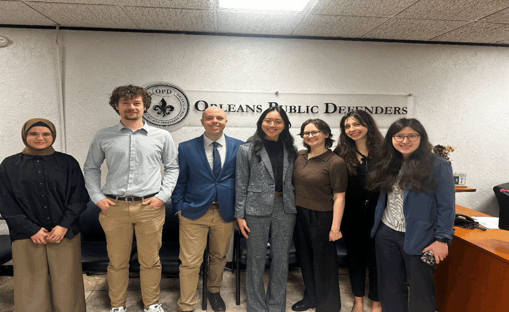 Group of NLaw students posting at the Orleans Public Defenders office